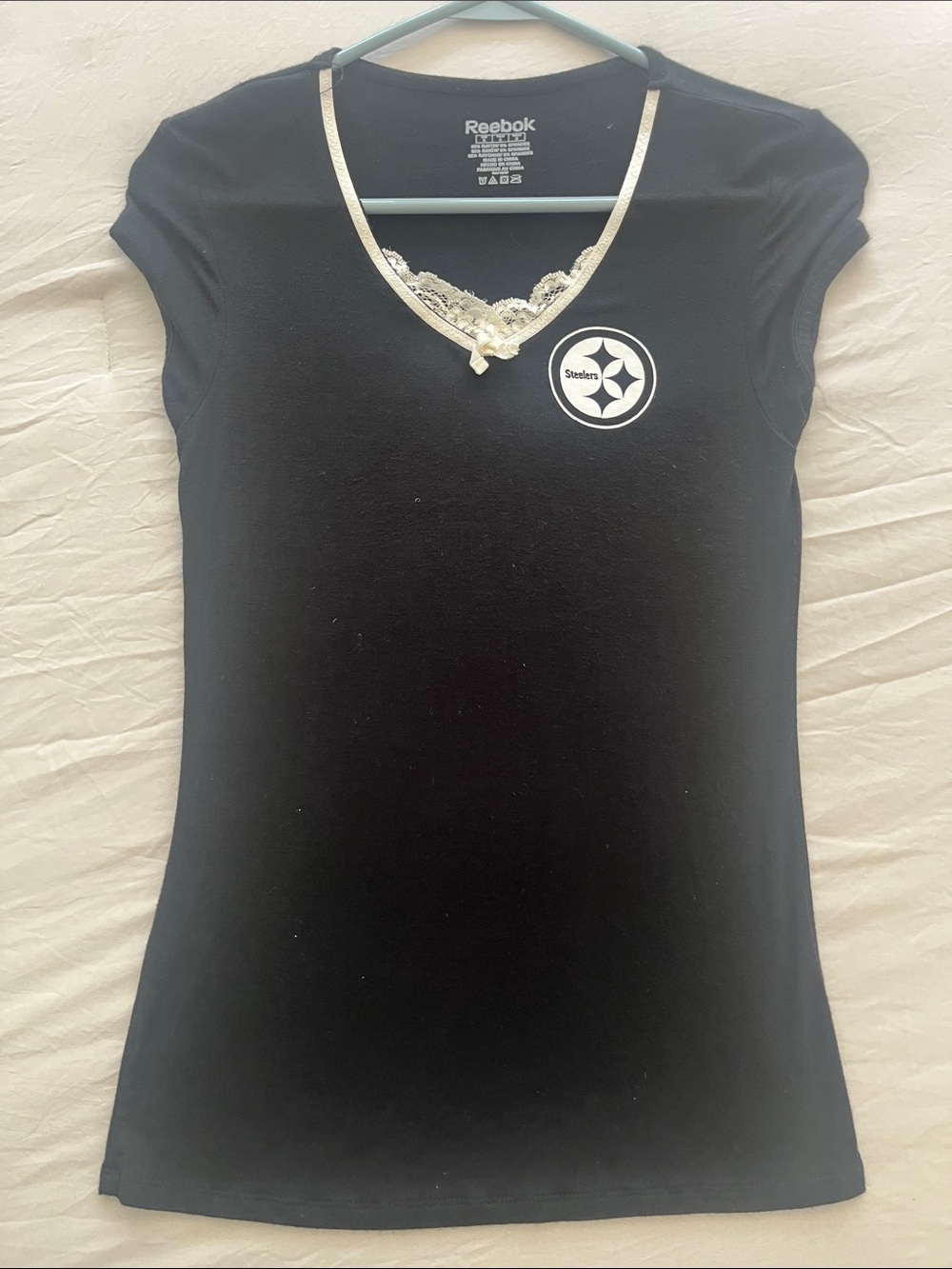 Reebok Women's Black V-Neck Tee with Cream Lace Trim and Steelers Logo